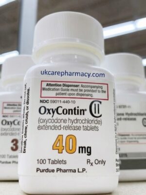 White prescription bottles of OxyContin extended-release tablets available to Order OxyContin online legally.